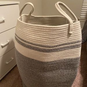 Grey and white laundry or storage basket